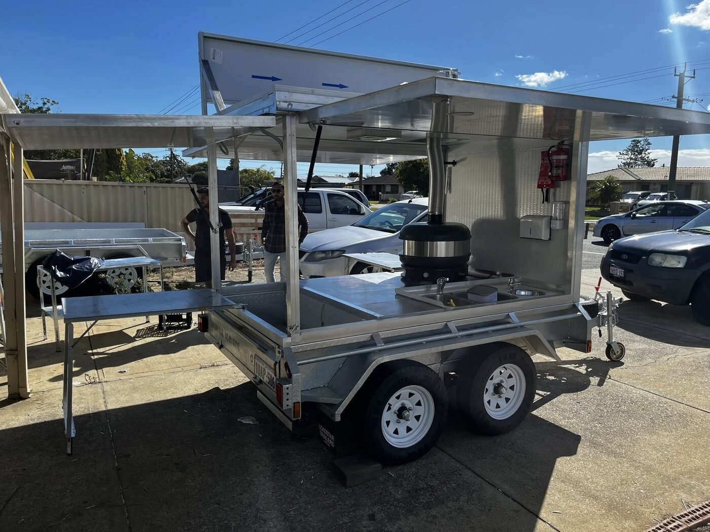 Fold-out serving window food truck build
